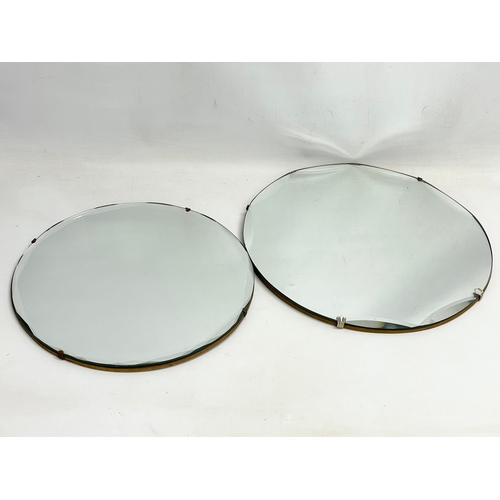 279 - 2 Art Deco bevelled mirrors. Largest 45cm