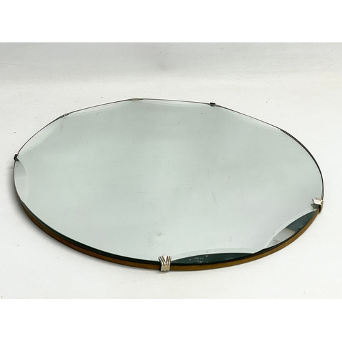 279 - 2 Art Deco bevelled mirrors. Largest 45cm