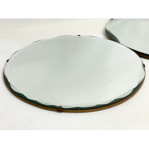 279 - 2 Art Deco bevelled mirrors. Largest 45cm