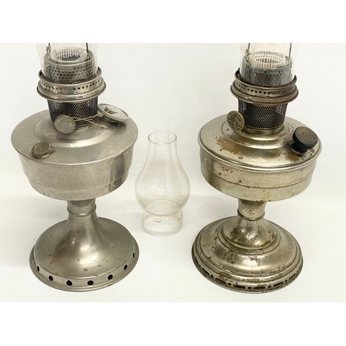 281 - 2 vintage Aladdin oil lamps with extra funnel. 59cm