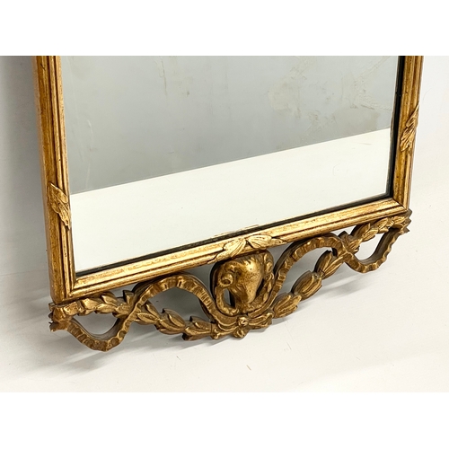 292 - An early 20th century gilt framed mirror. 40x92cm