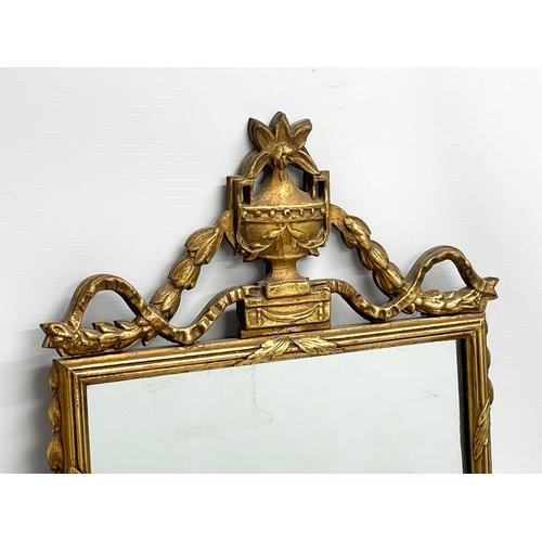 292 - An early 20th century gilt framed mirror. 40x92cm