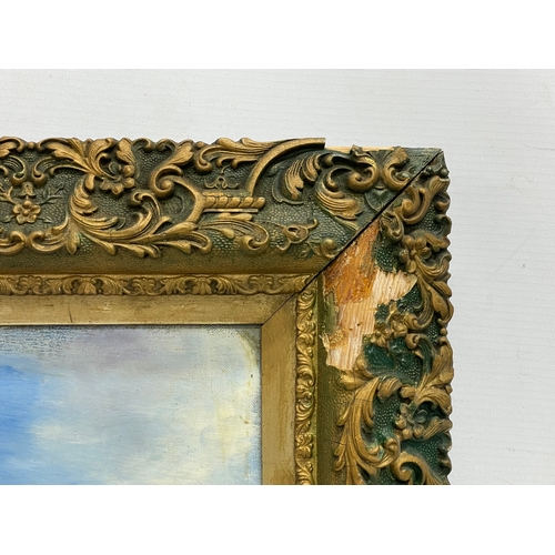 294 - A late 19th century ornate gilt framed oil painting. Painting measures 49.5x34.5cm.  Frame 65x50cm