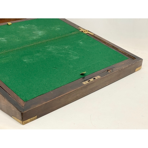 299 - A large Victorian rosewood brass bound writing slope with exterior side drawer. 51x26x17.5cm closed.