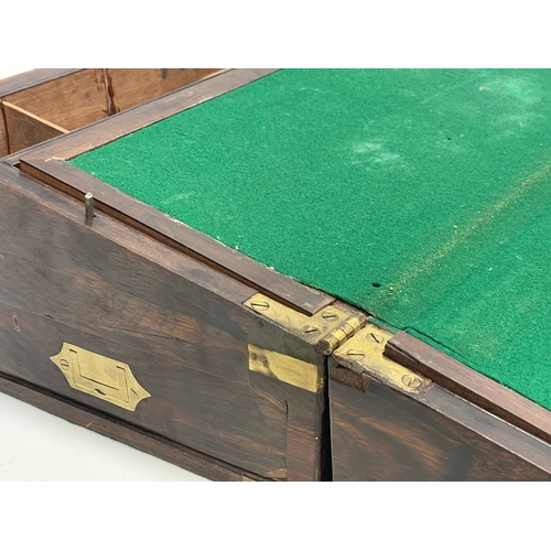 299 - A large Victorian rosewood brass bound writing slope with exterior side drawer. 51x26x17.5cm closed.