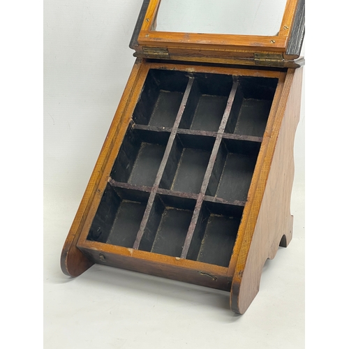 302 - An Edwardian oak table top display cabinet. 24x27x27.5cm