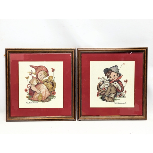 716 - A pair of M. J. Hummel Goebel framed tapestries. 36.5x38.5cm with frame.