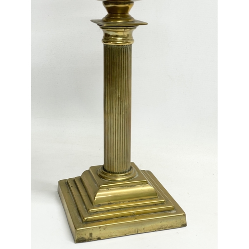 195R - A tall late Victorian brass double burner oil lamp. 70cm