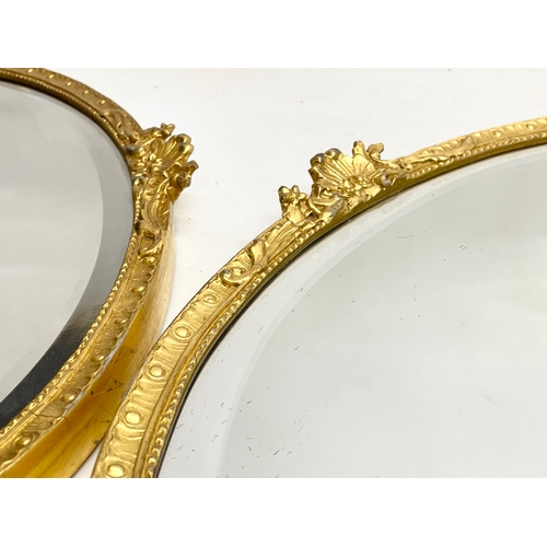 195V - A pair of early 20th century ornate gilt framed mirrors  from William Rodman & Co. Carvers, Gilders ... 