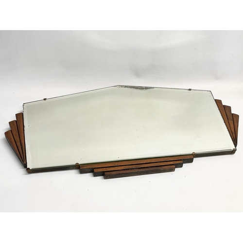 195W - A 1920’s Art Deco mirror. 77x43cm