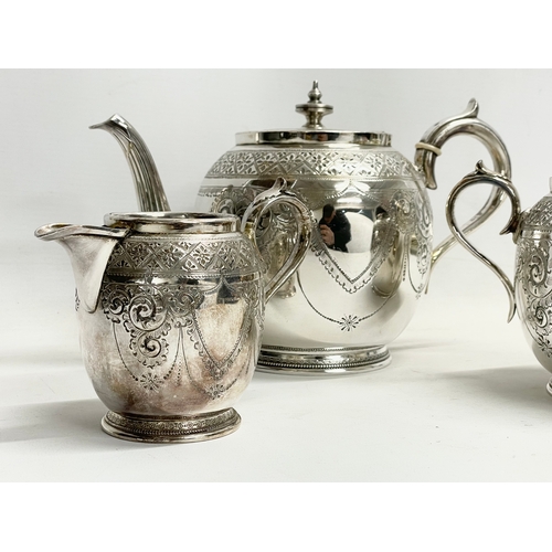 718 - A 3 piece late Victorian silver plated tea service with 2 silver plated trays.