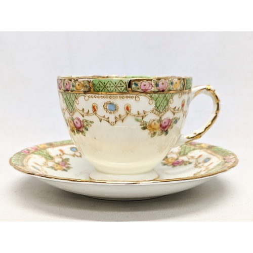 719 - A 20 piece vintage Sutherland tea set, including cake plate.