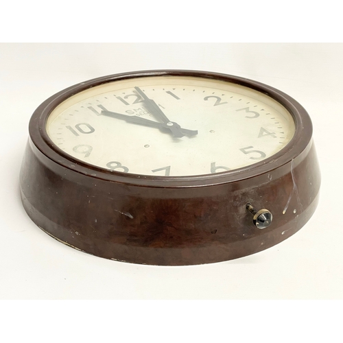 196G - A vintage Smiths Sectric Bakelite Station Clock. 1940’s. 37x9cm