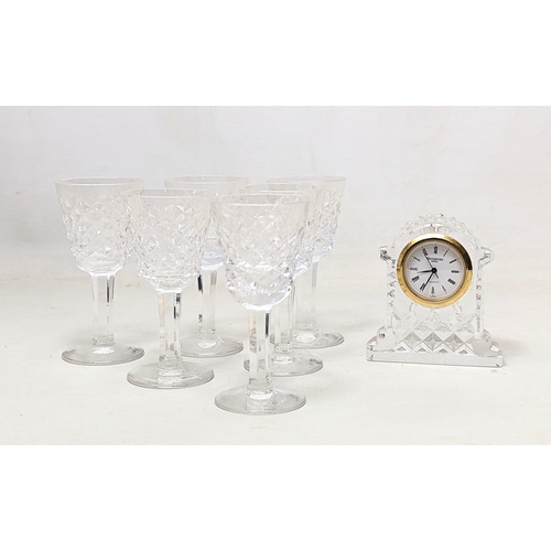 722 - A set of 6 Waterford Crystal glasses with a Waterford Crystal mantle clock. Clock measures 6.5x7.5cm