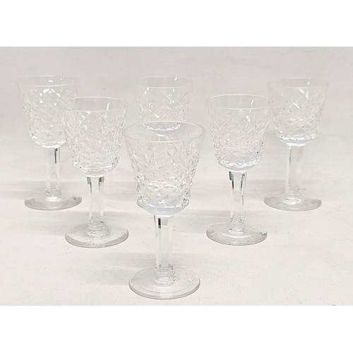 722 - A set of 6 Waterford Crystal glasses with a Waterford Crystal mantle clock. Clock measures 6.5x7.5cm