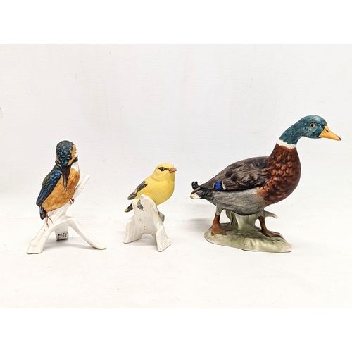 723 - A quantity of pottery birds including 3 Goebel, 2 Crown Staffordshire, and a Royal Osborne. Tallest ... 