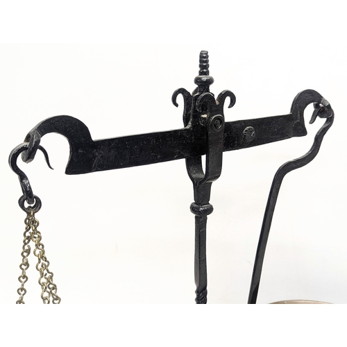 207D - A set of late Victorian cast iron scales with weights. 47.5cm