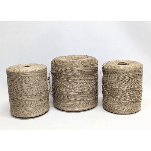 389C - 3 rolls of twine. Largest roll measures 21x24cm