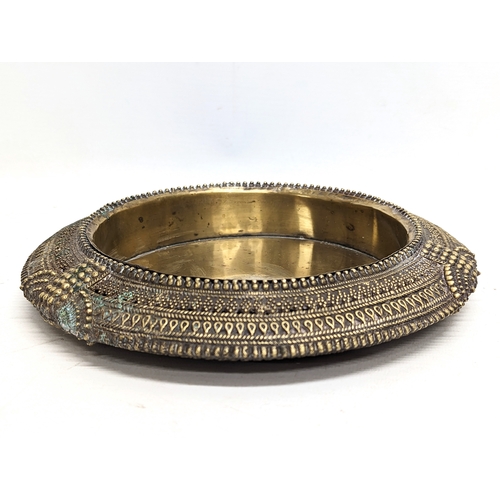 711 - A vintage brass ornate console bowl. 22cm