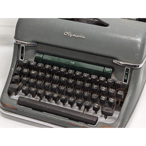 196T - A vintage Olympia Werke A. G. Wilhelmshaven typewriter, made in Western Germany.