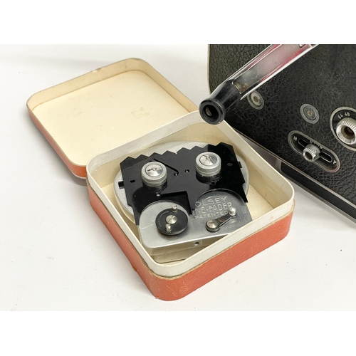 376C - A collection of vintage cameras. A Bolex H16 Reflex. A Kodak Brownie, lenses etc.