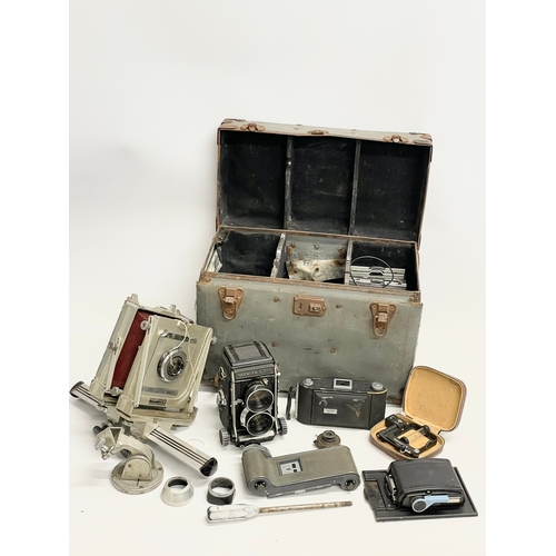 376D - A collection of vintage cameras. A Kodak Graphie View, a Mamiya C330, Ensign camera etc.