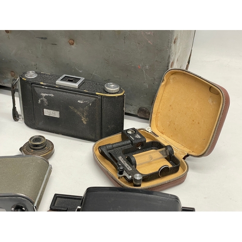 376D - A collection of vintage cameras. A Kodak Graphie View, a Mamiya C330, Ensign camera etc.