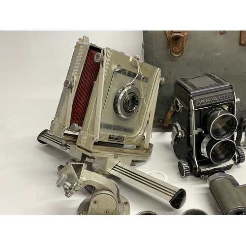 376D - A collection of vintage cameras. A Kodak Graphie View, a Mamiya C330, Ensign camera etc.