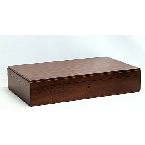 713 - A large mahogany cutlery case. 64x37x13cm