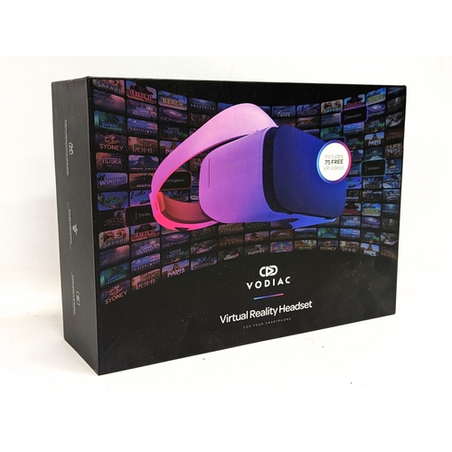 376F - A Vodiac Virtual Reality Headset, for your smartphone. Includes 75 free VR videos. Unopened.