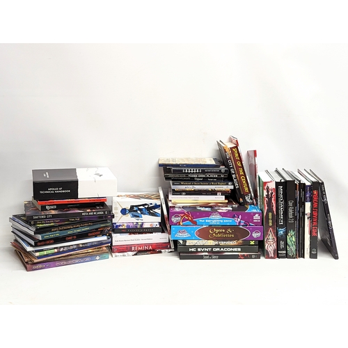 376M - A large quantity of books including Manga, Mind Jammers. With anime DVDs.