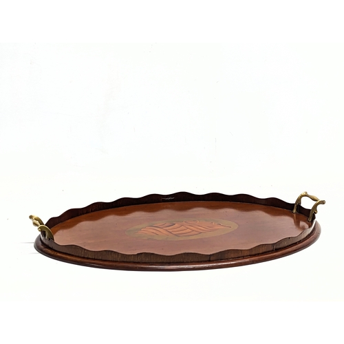 184B - An Edwardian inlaid mahogany tray with brass handles, circa 1900-1910.