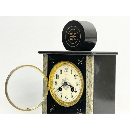 184F - A Victorian slate mantle clock with pendulum. 20x12x30.5cm