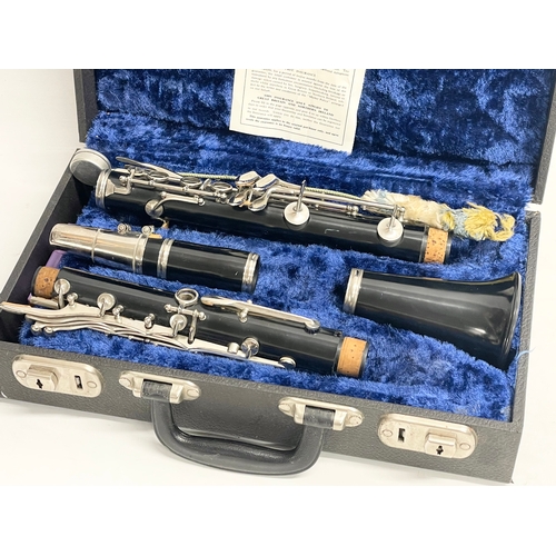 376T - A clarinet in case by Roosey & Hawkes, London. Case measures 35x20x10cm