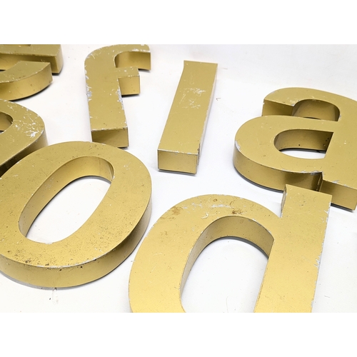 379F - A set of vintage alloy letters.