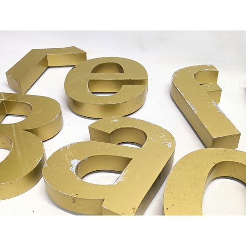 379F - A set of vintage alloy letters.