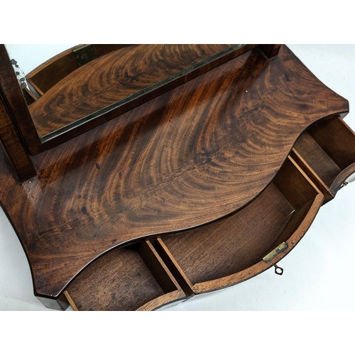 280K - A George III mahogany table top dressing mirror with original handles, circa 1800. 51x22x66cm