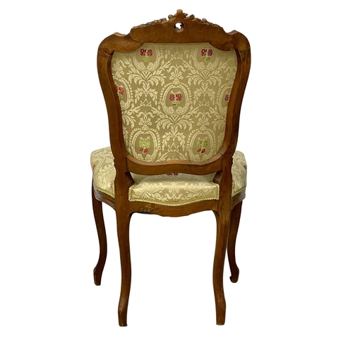 153 - A late 19th century French fruitwood side chair. Reupholstered.