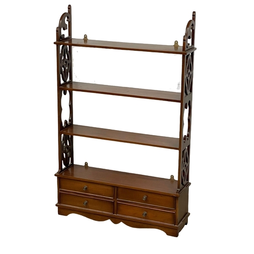 163 - A 4 tier mahogany shelving unit with 4 drawers. 71.5x18.5x113cm