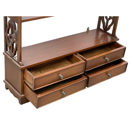 163 - A 4 tier mahogany shelving unit with 4 drawers. 71.5x18.5x113cm