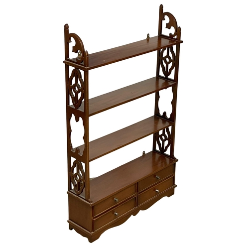 163 - A 4 tier mahogany shelving unit with 4 drawers. 71.5x18.5x113cm