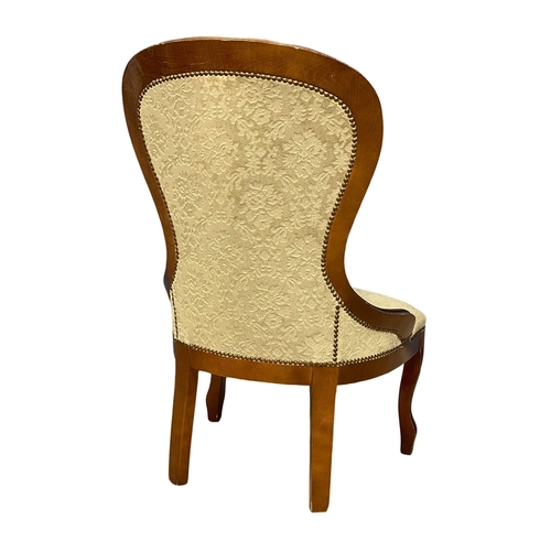 180 - A Victorian style mahogany spoon back chair.