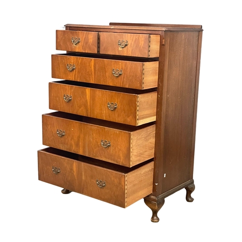 197 - A tall vintage mahogany chest of drawers on Queen Anne legs. 77x47.5x119cm