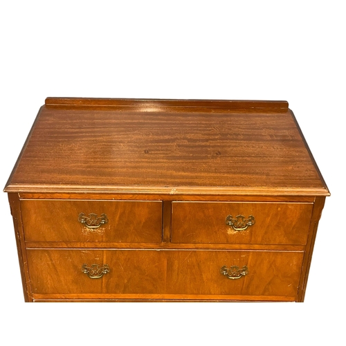 197 - A tall vintage mahogany chest of drawers on Queen Anne legs. 77x47.5x119cm