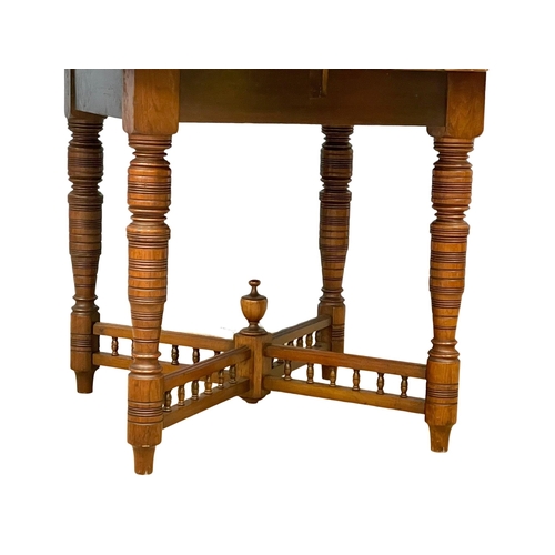 205 - A late Victorian Walnut centre/window table. Circa 1890. 100x65cm