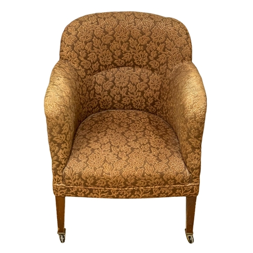 206 - A 1920’s tub armchair. 63x61x83cm