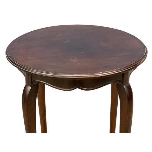 227 - A 1920’s mahogany occasional table. 42x69cm