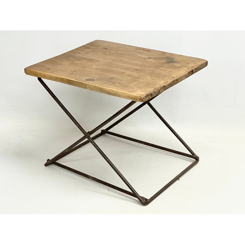 280L - A vintage pine and wrought iron table. 42x35x42cm