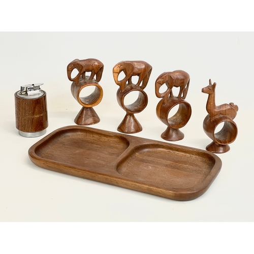 265F - A quantity of Mid Century teak. Including a tray 30.5cm, 4 napkin rings and a lighter.