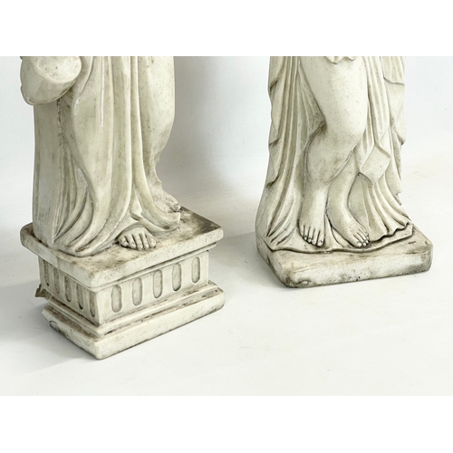 265E - A pair of large vintage good quality heavy resin garden figurines. 61cm